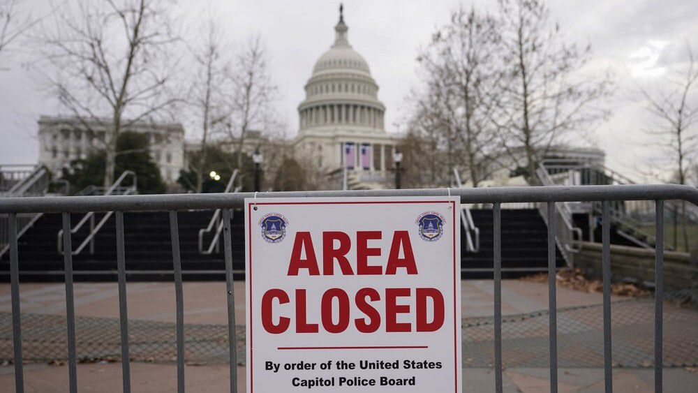 Signs are posted to close the area around the U.S. Capitol ahead of the inauguration of President-elect Joe Biden and Vice President-elect Kamala Harris in Washington. (AP Photo/Carolyn Kaster, File)
