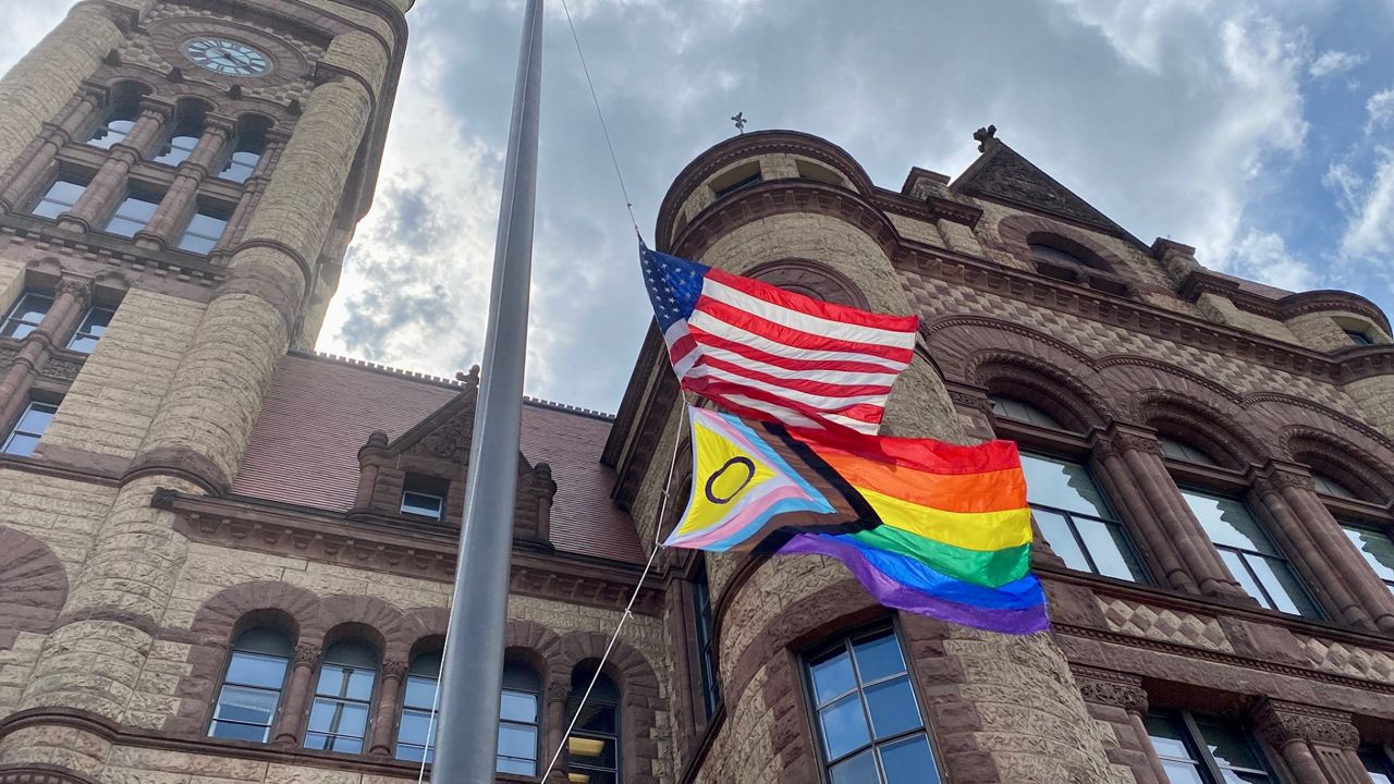 An image of the new, more inclusive Pride flag at Cincinnati City Hall. (Casey Weldon/Spectrum News 1)