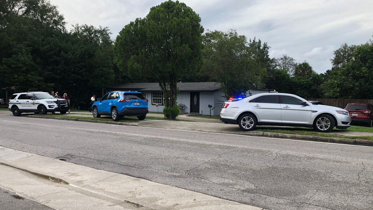 Orange County Sheriff's investigators respond to a report of a dead child on Indian Hills Road Friday. (Photo: Eric Mock)