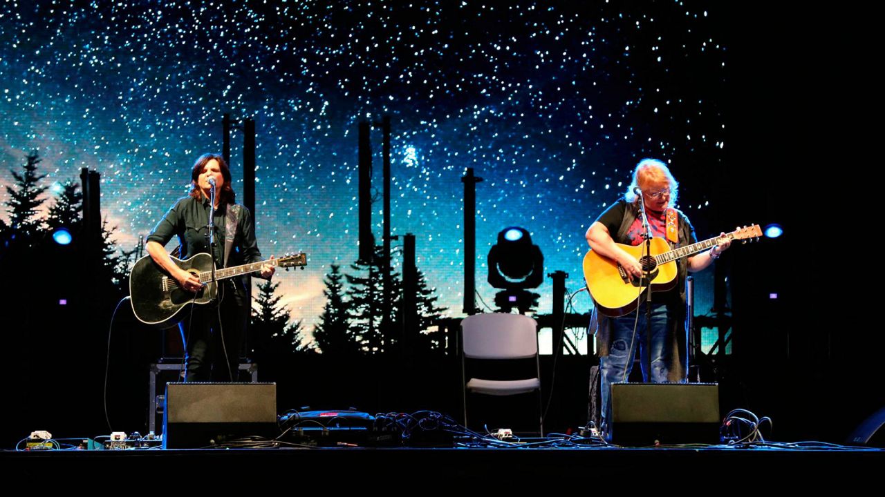Amy Ray and Emily Saliers with the Indigo Girls perform during the Live From the Drive-In concert series at the Ameris Bank Amphitheatre on Friday, October 23, 2020, in Atlanta. (Photo by Robb Cohen/Invision/AP)