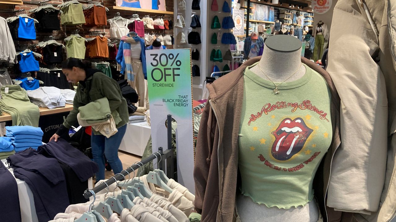 A Rolling Stones T-shirt is displayed in the Westfield Garden State Plaza shopping mall in Paramus, New Jersey, on Dec. 17. (AP Photo/Ted Shaffrey, File)