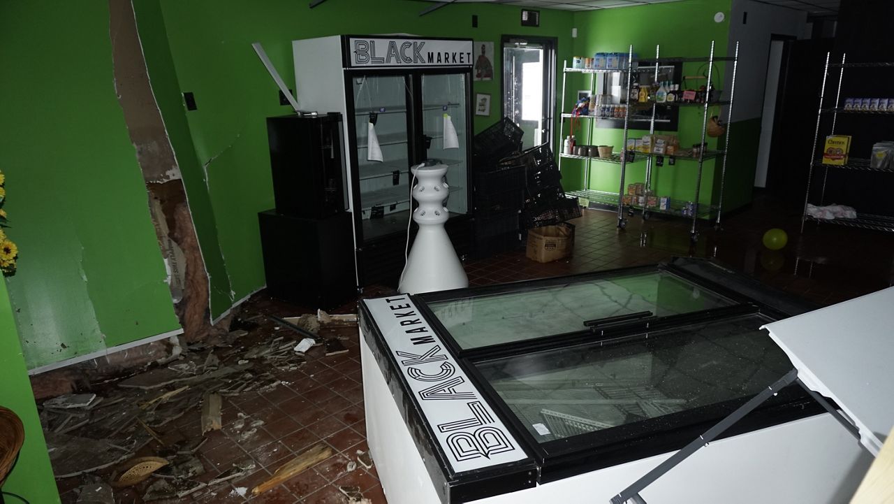 Damage inside the Black Market KY grocery store (Spectrum News 1/Mason Brighton)