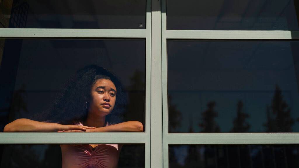 Marina Aina, a 21-year-old student majoring in American Studies at Pomona College, poses for photos on the school's campus in Claremont, Calif., Thursday, Sept. 22, 2022. Aina was used to getting paid for her internships and could not see taking an unpaid opportunity over a summer job. "If I felt that it wasn't compensated then I wouldn't go for it because I wouldn't have the funds to cover it," Aina says. "I wouldn't want to ask my parents, who are helping me pay for college, to pay for something I'm doing over the summer." (AP Photo/Jae C. Hong)