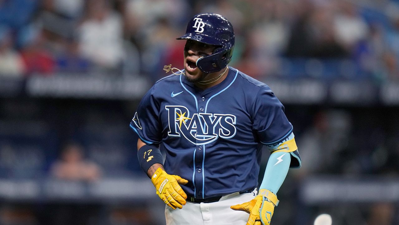 Tampa Bay Rays' Isaac Paredes reacts after hitting a three-run home run off Texas Rangers relief pitcher Yerry Rodriguez during the fifth inning of a baseball game Tuesday, April 2, 2024, in St. Petersburg, Fla. (AP Photo/Chris O'Meara)