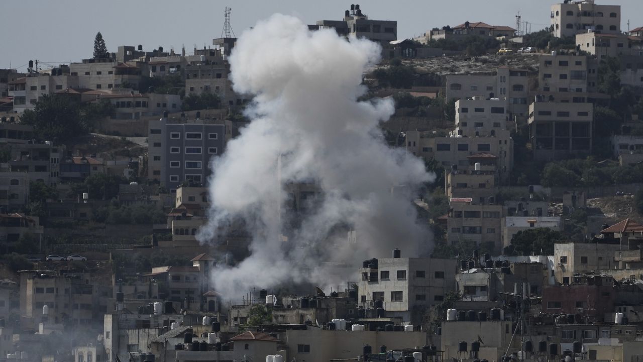 Smoke rises during an Israeli military raid of the militant stronghold of Jenin in the occupied West Bank in July. (AP Photo/Majdi Mohammed)