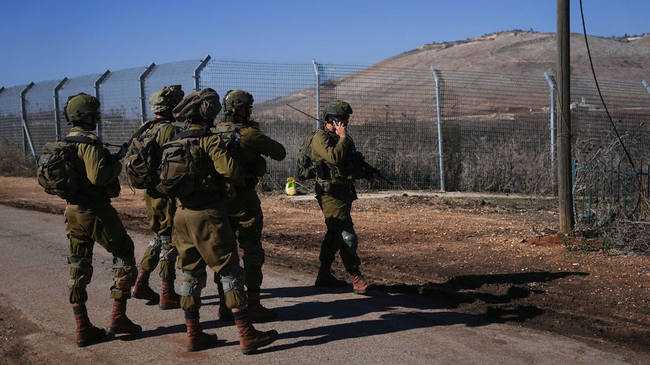 Israeli soldiers patrol the perimeter of the agricultural settlement of Avivim, next to the Lebanese border in upper Galilee, Israel, Monday Dec. 2, 2024. (AP Photo/Ohad Zwigenberg)