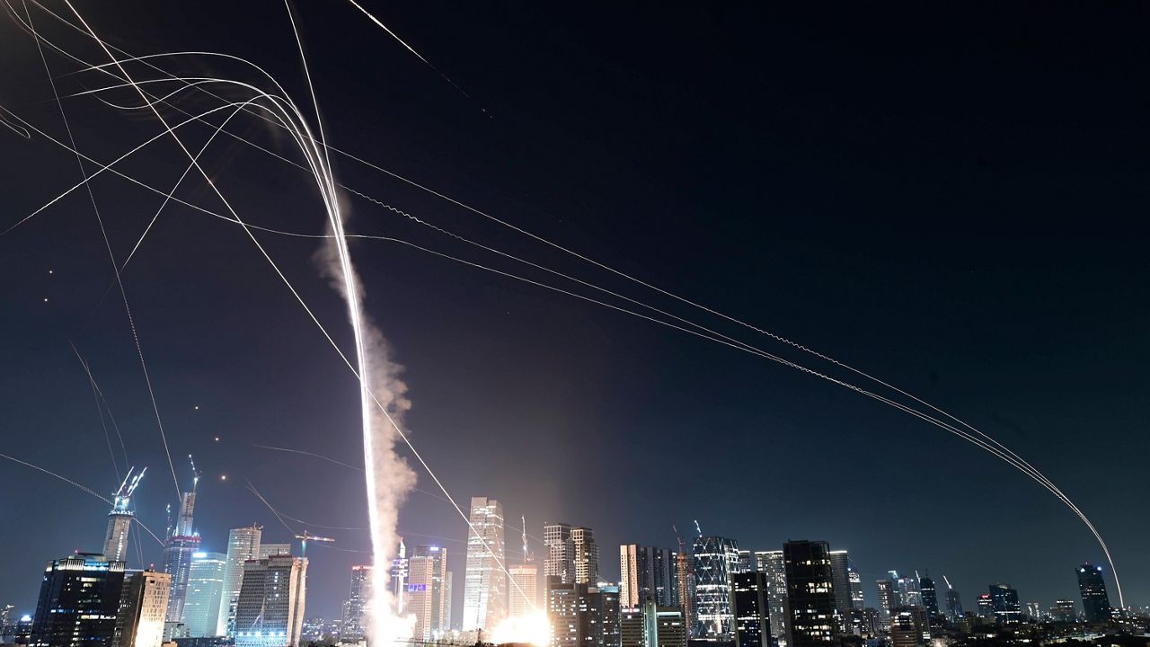 Israeli Iron Dome air defense system fires to intercept missiles over Tel Aviv, Israel, Friday, June 13, 2025. (AP Photo/Tomer Neuberg)