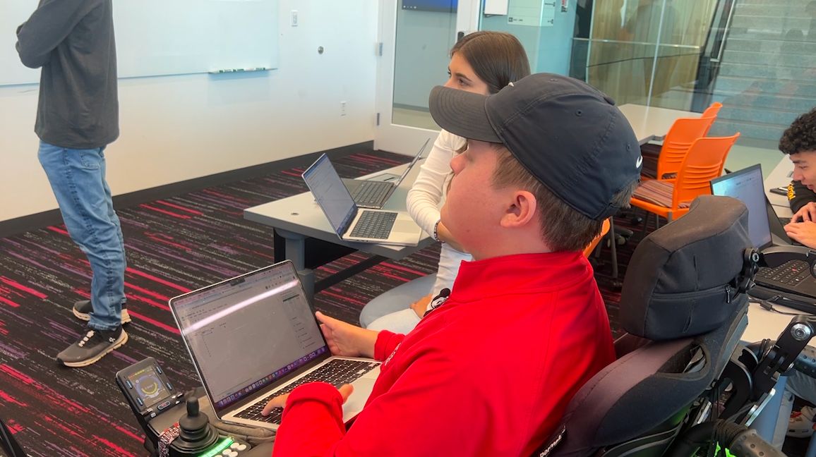 Jack Bolton, a sophomore at N.C. State, is designing an improved grabber tool that will handle a wider variety of objects. (Spectrum News 1/Ashley Van Havere)