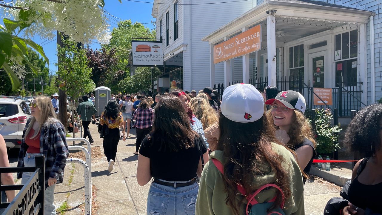 The line of fans to see Jack Harlow wrapped around the block near Guestroom Records on Frankfort Avenue. (Spectrum News 1/Mason Birghton)
