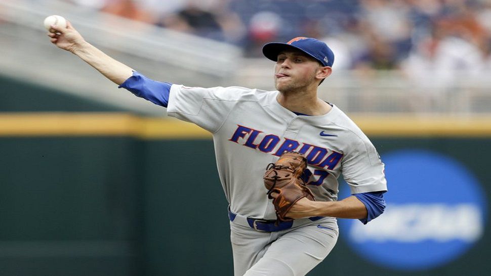 Florida pitcher Jackson Kowar (37) delivers against Texas in the fourth inning of an NCAA College World Series baseball elimination game in Omaha, Neb., Tuesday, June 19, 2018. (AP Photo/Nati Harnik)