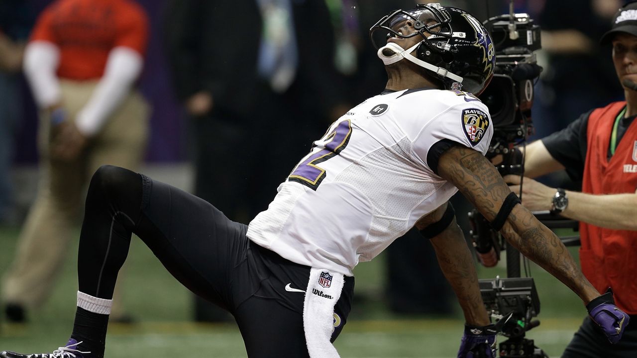 In this Feb. 3, 2013, file photo, Baltimore Ravens wide receiver Jacoby Jones (12) reacts after returning a kickoff for a over 100-yards for a touchdown during the second half of the NFL Super Bowl XLVII football game against the San Francisco 49ers in New Orleans. (AP Photo/Elaine Thompson, File)