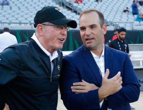 Jacksonville Jaguars executive vice president of football operations Tom Coughlin, left, talks with team general manger David Caldwell before an NFL preseason football game against the Tampa Bay Buccaneers.
