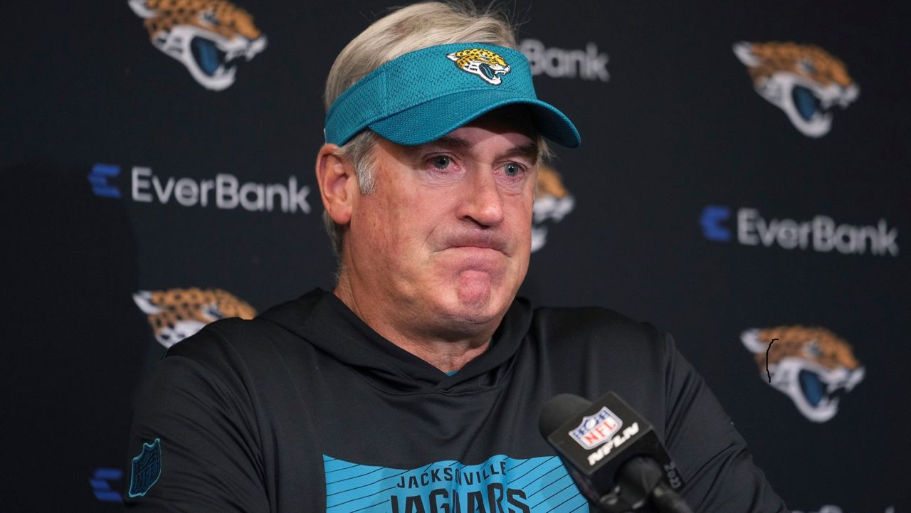 Jacksonville Jaguars head coach Doug Pederson pauses during a news conference after an NFL football game against the Indianapolis Colts, Sunday, Jan. 5, 2025, in Indianapolis. The Colts won 26-23 in overtime. (AP Photo/Michael Conroy)