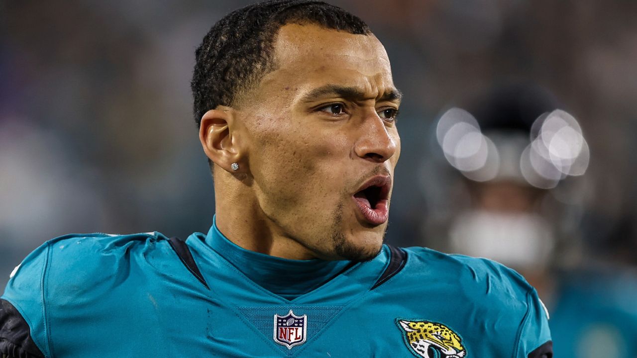 Jacksonville Jaguars tight end Evan Engram walks the sideline during an NFL football game against the Tennessee Titans, Jan. 7, 2023, in Jacksonville, Fla. Engram and the Jaguars agreed Sunday, July 16, 2023 to a three-year, $41.25 million contract that includes $24 million guaranteed, according to a person familiar with negotiations. (AP Photo/Gary McCullough, file)