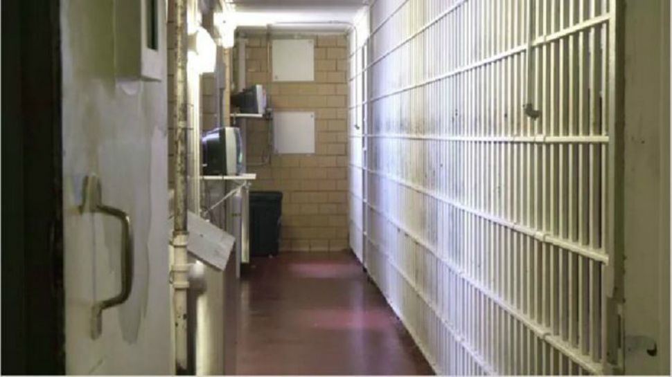 Photo of a jail hallway. 