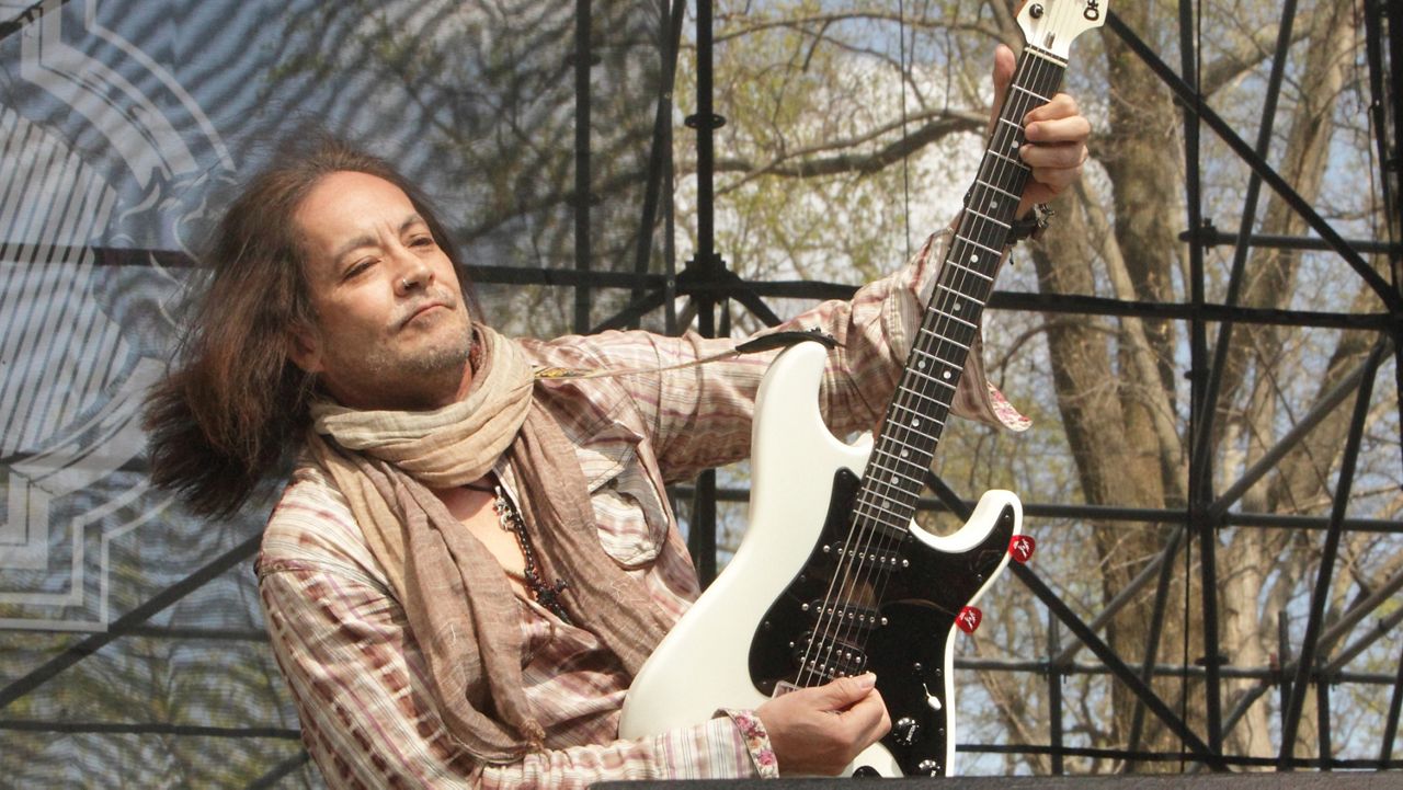 Jake E. Lee, former guitarist for Ozzy Osbourne, performs in concert during the M3 Rock Fest at Merriweather Post Pavilion on April 26, 2014, in Columbia, Md. (Photo by Owen Sweeney/Invision/AP)