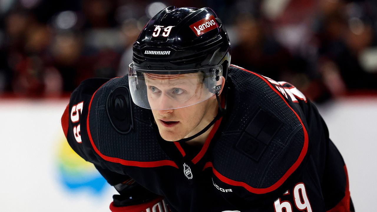 Carolina Hurricanes' Jake Guentzel (59) watches the puck during an NHL hockey game against the Boston Bruins in Raleigh, N.C., April 4, 2024. (AP File Photo/Karl B DeBlaker)