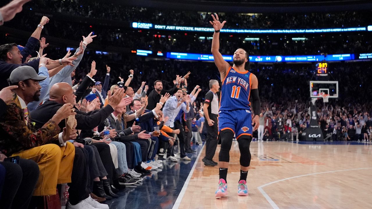 Jalen Brunson gestures to fans after making a shot during a game against the Indiana Pacers in New York on Tuesday, May 14, 2024.