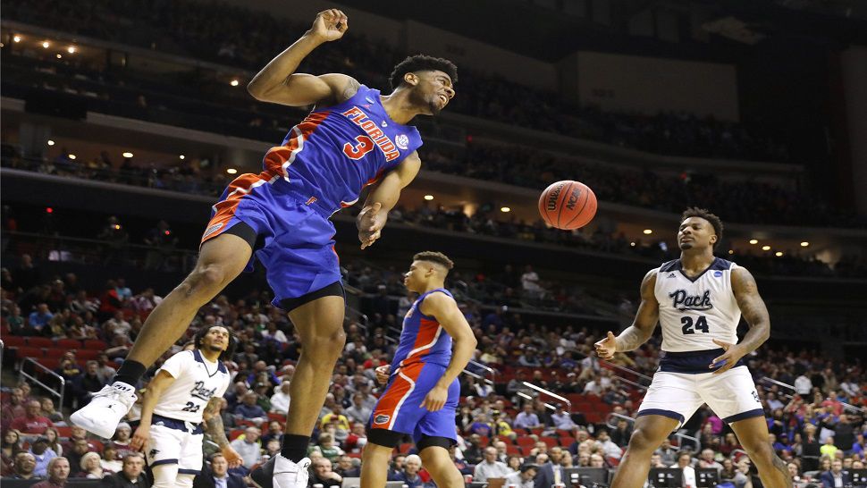 Jalen Hudson scored 15 points as the 10th-seeded Gators won their tournament opener for the third straight year.