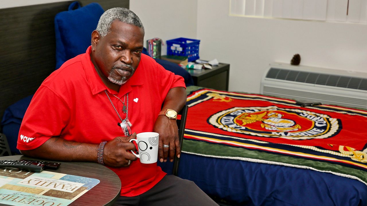 Charles Wright, a formerly homeless veteran, sits in his home at Buena Esperanza, a former motel converted into permanent supportive housing in Anaheim (Courtesy: For Jamboree by JuanTallo.com)