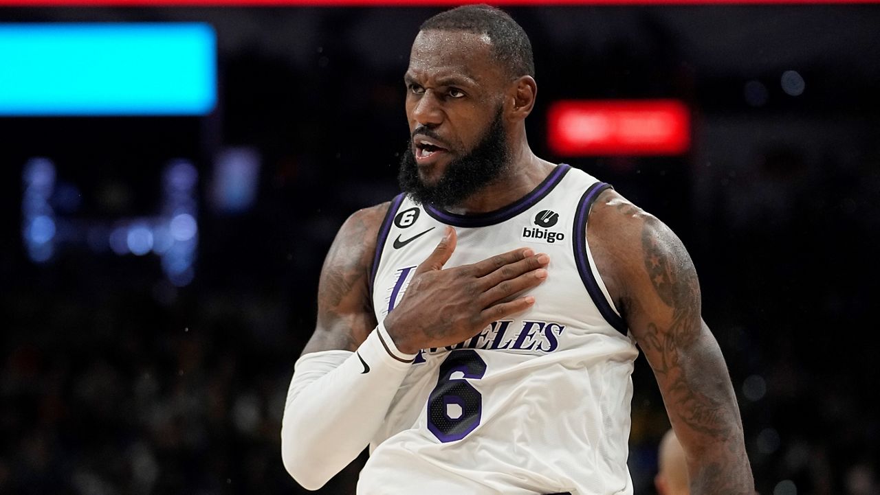 Los Angeles Lakers forward LeBron James (6) celebrates a score against the San Antonio Spurs during the second half of an NBA basketball game in San Antonio, Saturday, Nov. 26, 2022. (AP Photo/Eric Gay)