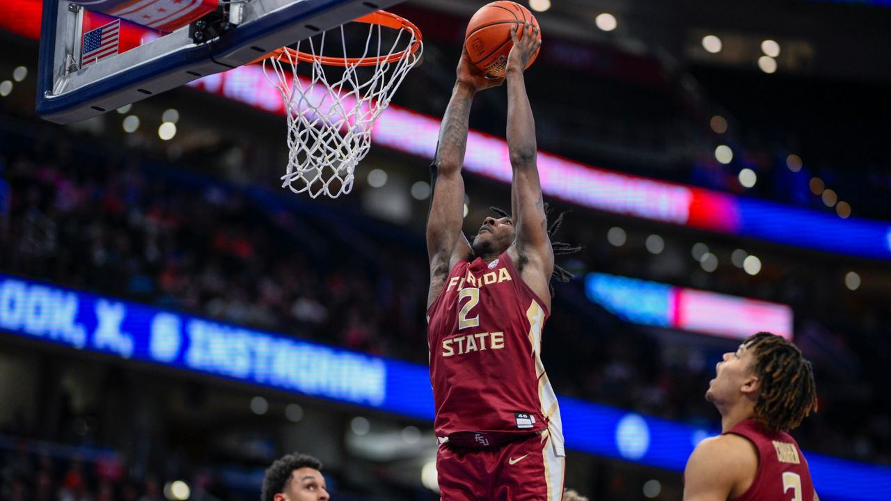 Florida State forward Jamir Watkins (2), who scored 34 points, dunks the ball in the 2nd round of the ACC Tournament on Wednesday, March 13, 2024, in Washington. (AP Photo/Nick Wass)