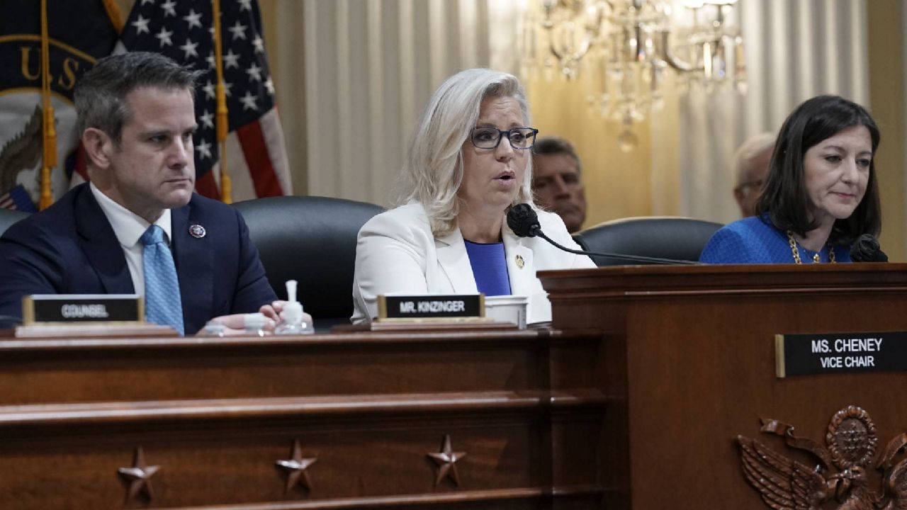FILE - Vice Chair Liz Cheney, R-Wyo., speaks as the House select committee investigating the Jan. 6 attack on the U.S. Capitol holds a hearing at the Capitol in Washington, Thursday, July 21, 2022. Rep. Adam Kinzinger, R-Ill., left, and Rep. Elaine Luria, D-Va., right, listen. The House Jan. 6 committee will share 20 of its interview transcripts with the Justice Department as federal prosecutors have been increasingly focused on efforts by former President Donald Trump and his allies to overturn the results of the election. (AP Photo/J. Scott Applewhite, File)