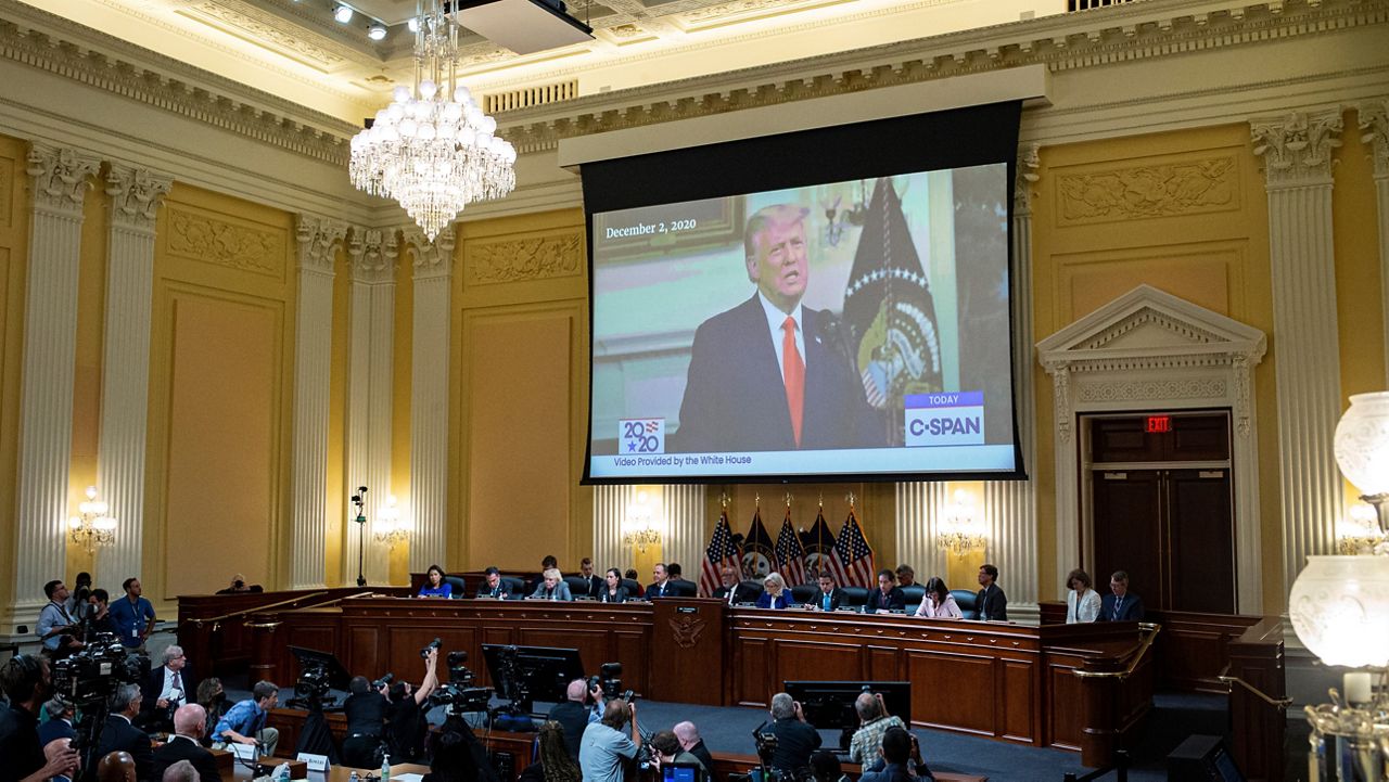 A video exhibit is displayed as the House select committee investigating the Jan. 6 attack on the U.S. Capitol continues to reveal its findings of a year-long investigation, at the Capitol in Washington, Tuesday, June 21, 2022. (Al Drago/Pool Photo via AP)