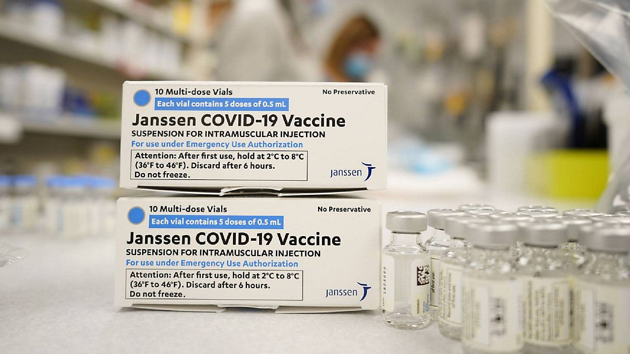 FILE - In this March 6, 2021, file photo, boxes stand next vials of Johnson & Johnson COVID-19 vaccine in the pharmacy of National Jewish Hospital for distribution in Denver. U.S. health officials are weighing next steps as they investigate unusual blood clots in a small number of people given the vaccine, a one-dose shot that many countries hoped would help speed protection against the pandemic. (AP Photo/David Zalubowski, File)