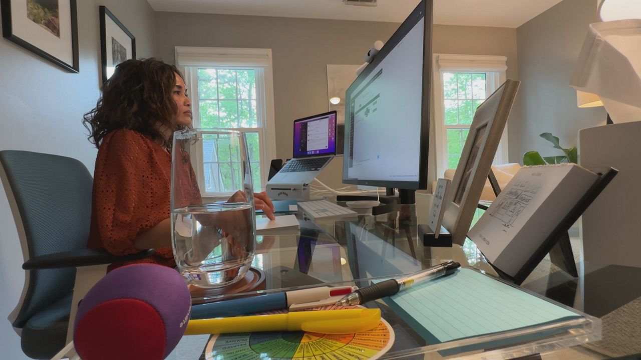 Cuaresma at her home office where she connects with patients virtually