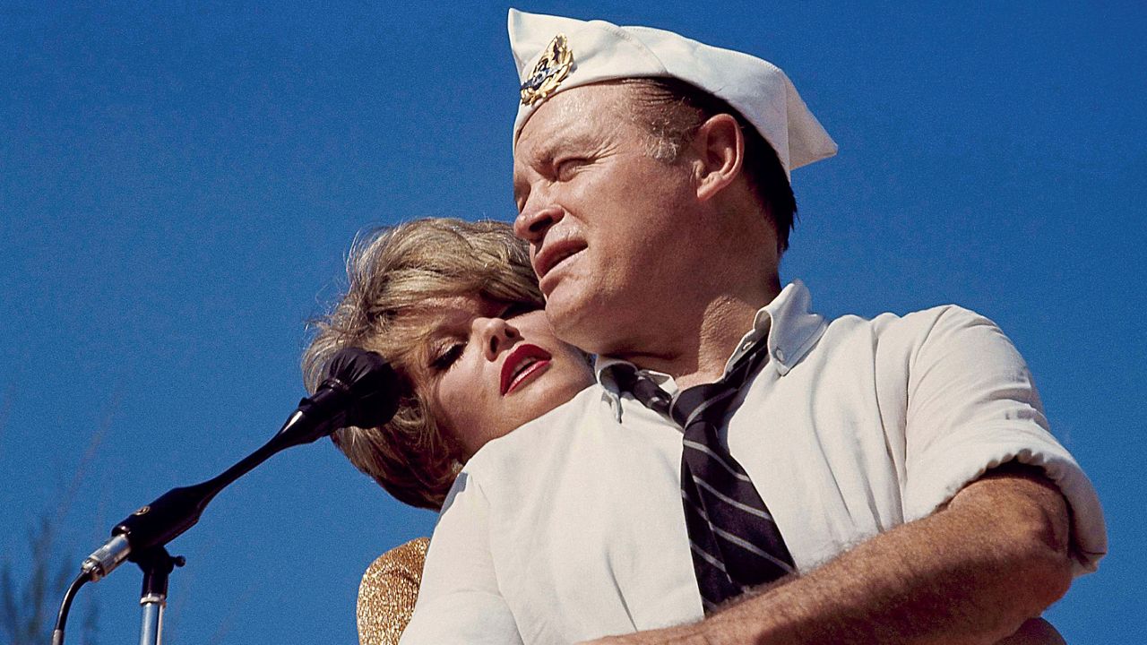 Bob Hope and Janis Paige hug during the annual Christmas show in Saigon, Vietnam, Dec. 25, 1964. Paige, a popular actor in Hollywood and in Broadway musicals and comedies who danced with Fred Astaire, toured with Bob Hope and continued to perform into her 80s, has died Sunday, June 2, 2024, of natural causes at her Los Angeles home, longtime friend Stuart Lampert said Monday. (AP Photo)