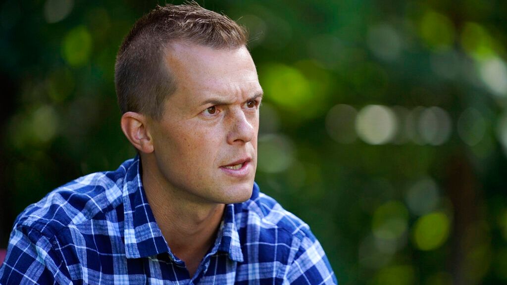 U.S. Rep. Jared Golden, D-Maine, speaks to a reporter at his home, Thursday, Sept. 1, 2022, in Lewiston. (AP Photo/Robert F. Bukaty)