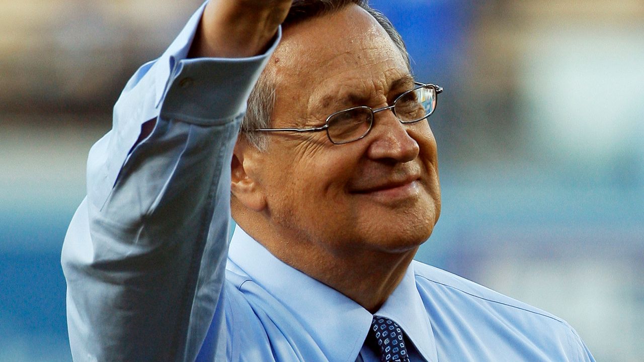 Jaime Jarrin, Los Angeles Dodgers Hall of Fame Spanish-language broadcaster, is honored for his 54 years with the team before an interleague game against the Los Angeles Angels at Dodger Stadium in Los Angeles, in this Monday, June 11, 2012, file photo.  (AP Photo/Reed Saxon, File)