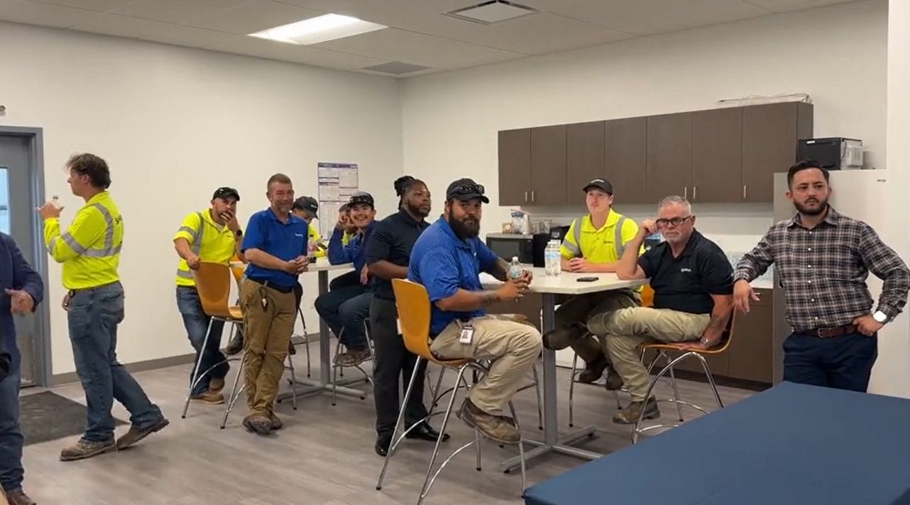 Attendees of a ribbon-cutting event in Jasper County, TX (Spectrum News 1)