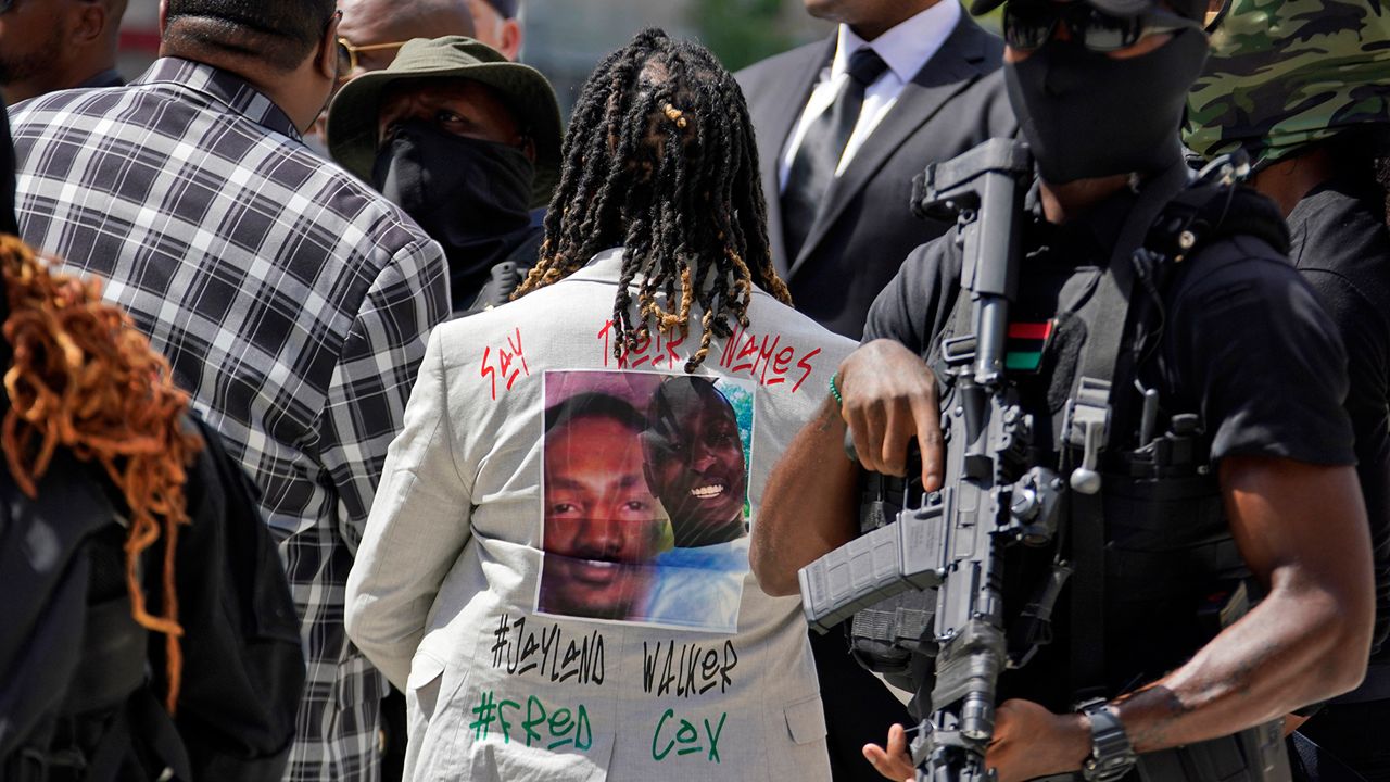 People gather to pay their respects at a memorial service in for Jayland Walker, Wednesday, July 13, 2022. (AP Photo/Gene J. Puskar)