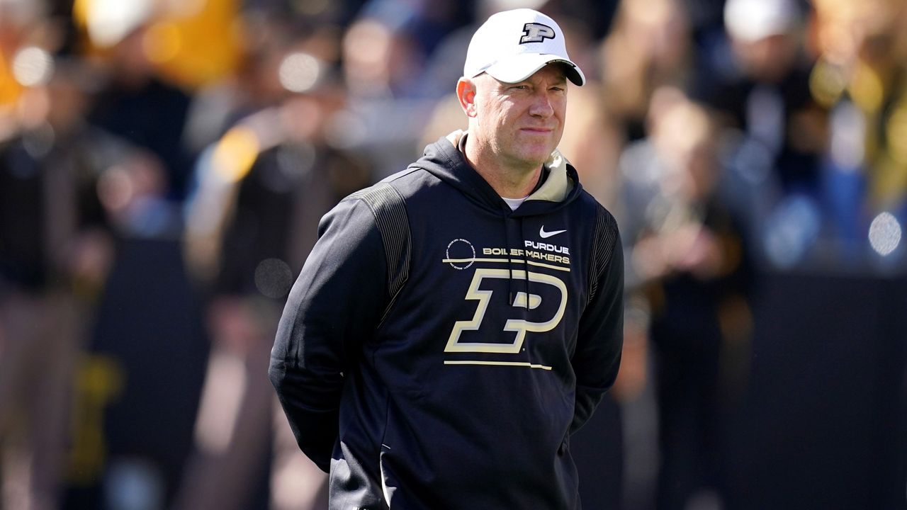 Purdue head coach Jeff Brohm talks to reporters during an NCAA college football news conference at the Big Ten Conference media days, at Lucas Oil Stadium, Wednesday, July 27, 2022, in Indianapolis. (AP Photo/Darron Cummings)