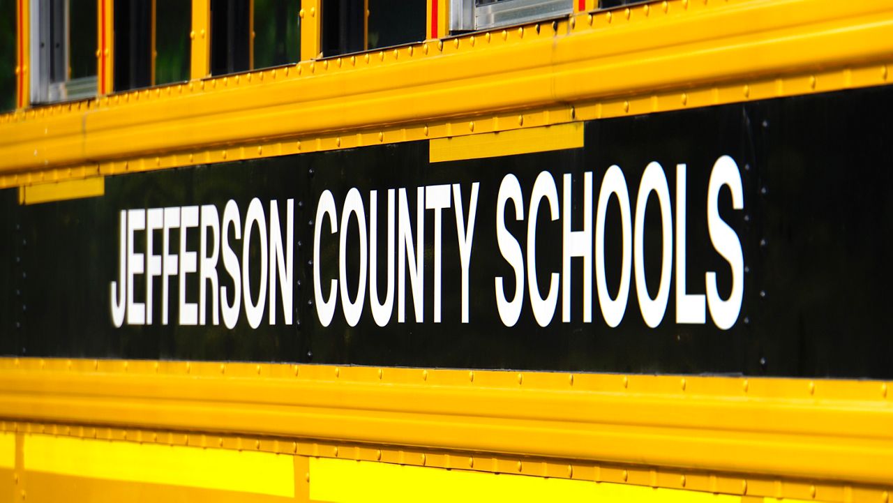 Louisville schools, families file motion to pause lawsuit for cutting busing