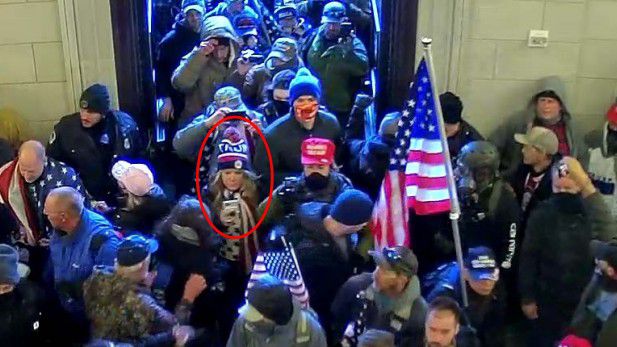 A video screen grab appears to show Frisco, Texas, resident Jenna Ryan inside the U.S. Capitol during the January 6 riot. (Source: United States District Court for the District of Columbia)