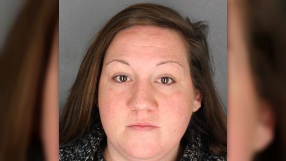 Woman arrested after accusation of assaulting child