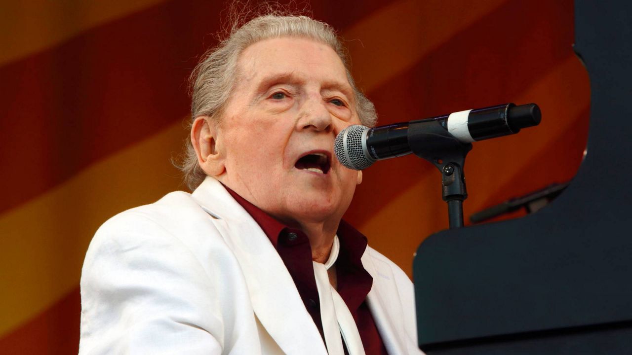 Jerry Lee Lewis performs at the New Orleans Jazz & Heritage Festival in New Orleans on May 2, 2015. (Photo by John Davisson/Invision/AP)