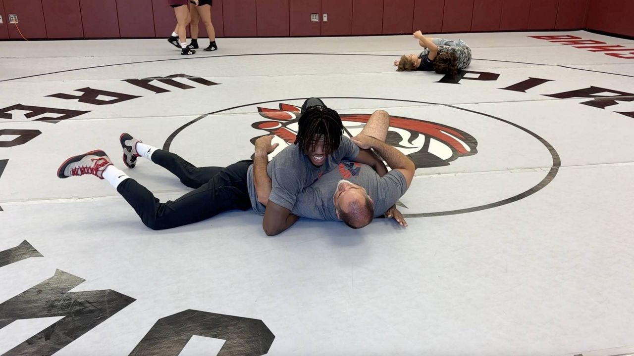 Braden Rivers Jessey Colas becomes wrestling state champion