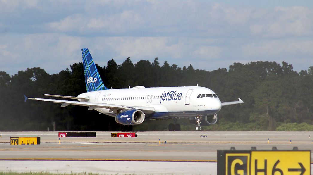 A jetBlue plane prepares for take off at Orlando International Airport (Spectrum News 13/Greg Angel)