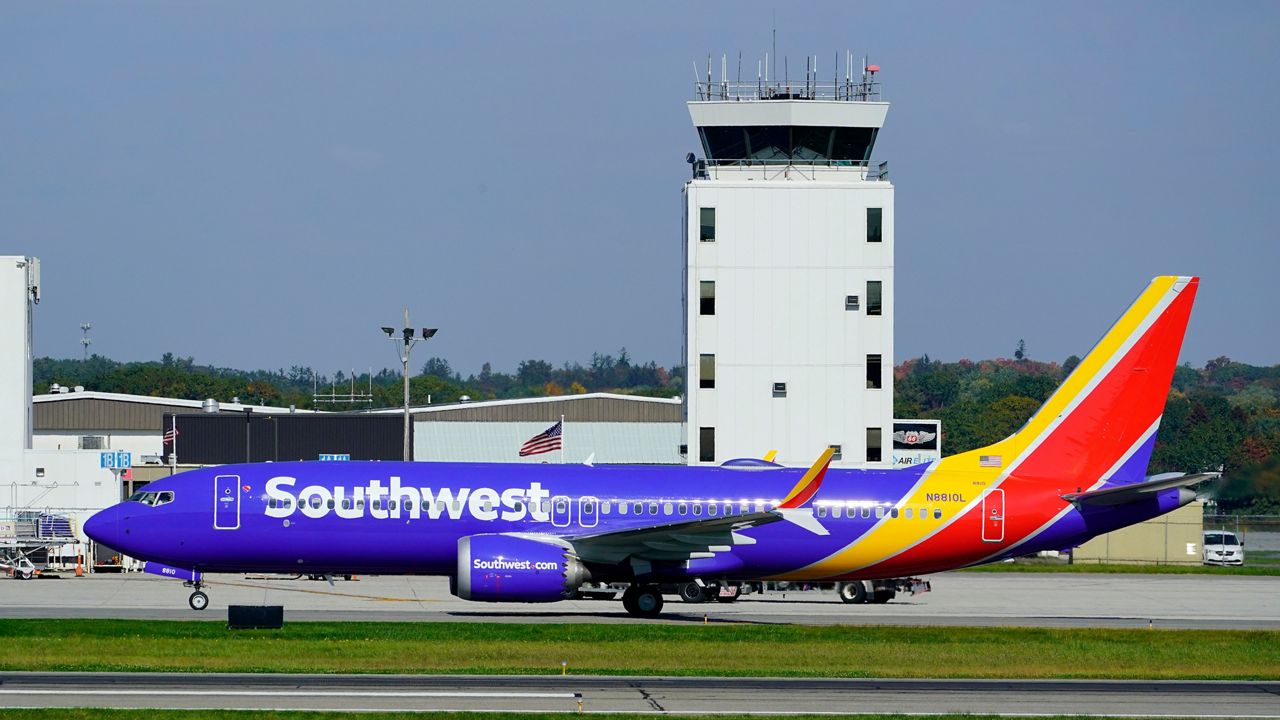 A Southwest Airlines flight taxis to the gate after arriving at the Portland Jetport, Wednesday, Oct. 13, 2021, in Portland. (AP Photo/Robert F. Bukaty, file)