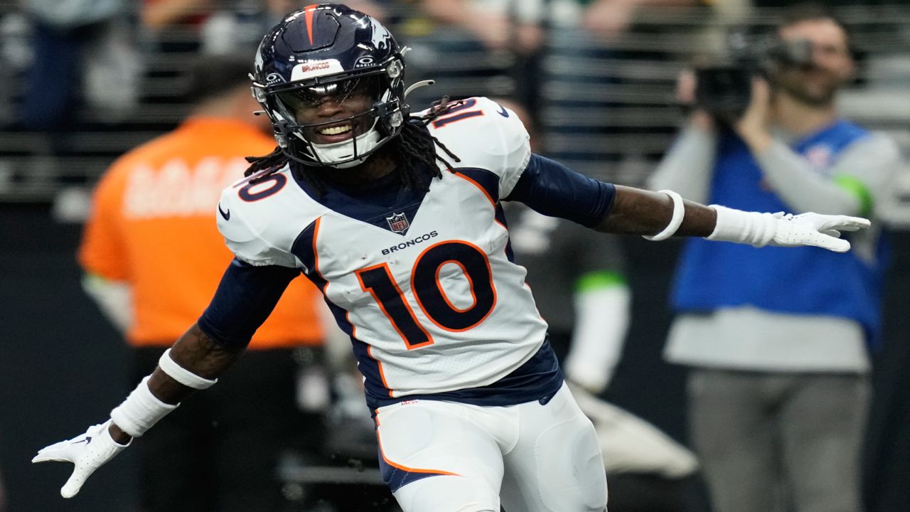 Denver Broncos wide receiver Jerry Jeudy (10) celebrates after scoring against the Las Vegas Raiders during an NFL football game, Sunday, Jan. 7, 2024, in Las Vegas.