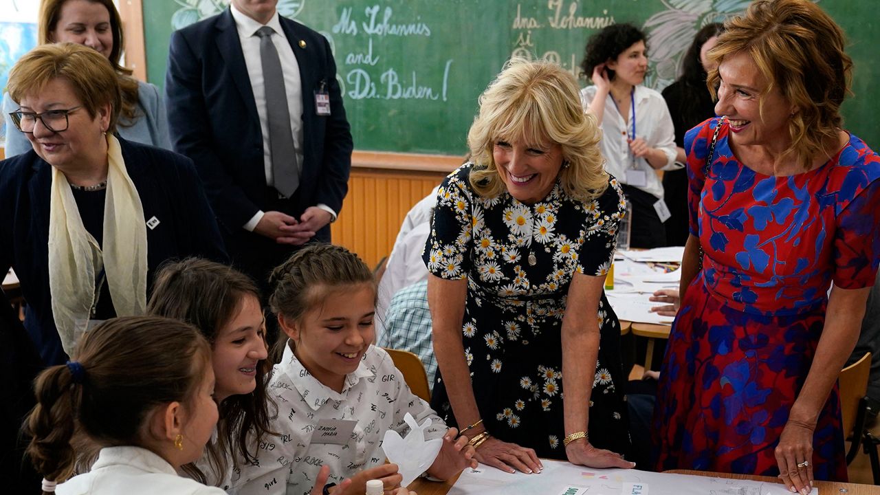 First lady Jill Biden and first lady of Romania Carmen Iohannis visit a classroom at the Școala Gimnaziala Uruguay, or Uruguay School, in Bucharest Romania, Saturday, May 7, 2022. (AP Photo/Susan Walsh, Pool)