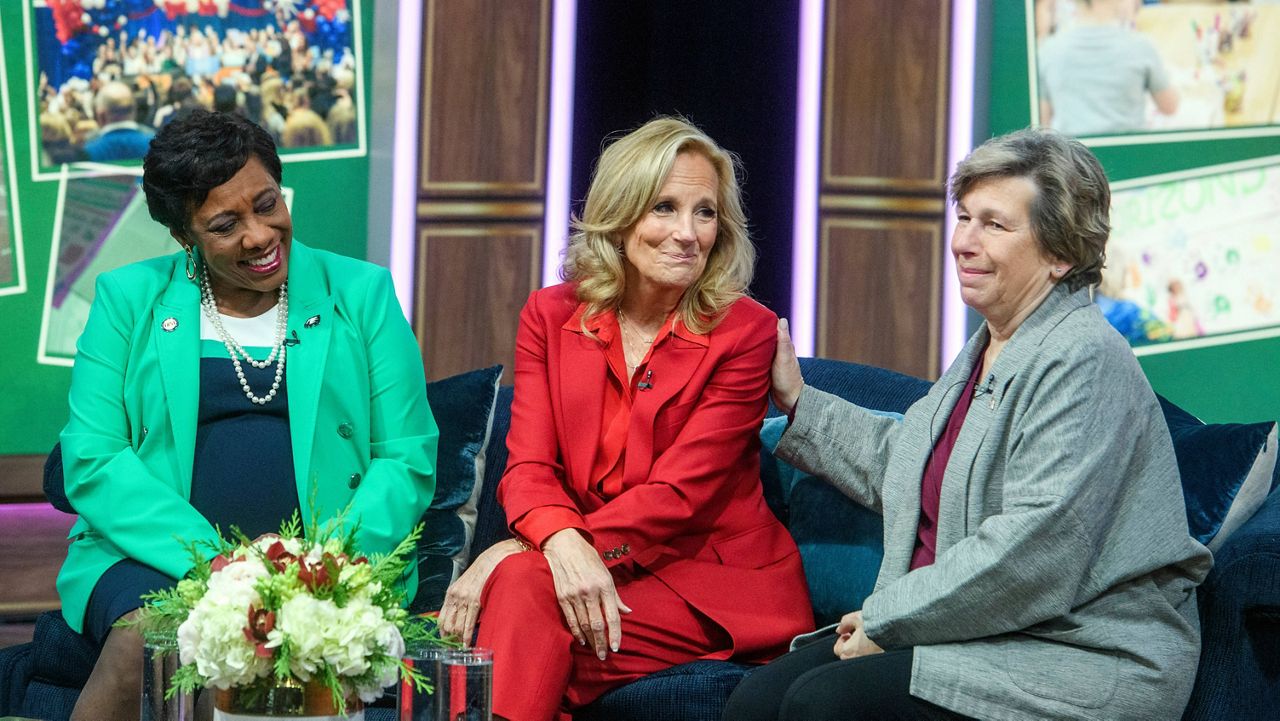 First lady Jill Biden, center, is joined by Becky Pringle, president of National Education Association, left, and Randi Weingarten, president of American Federation of Teachers, right, during a virtual thank you event for educators with the American Federation of Teachers and the National Education Association, in the South Court Auditorium on the White House complex in Washington, Monday, Dec. 16, 2024. (AP Photo/Rod Lamkey, Jr.)