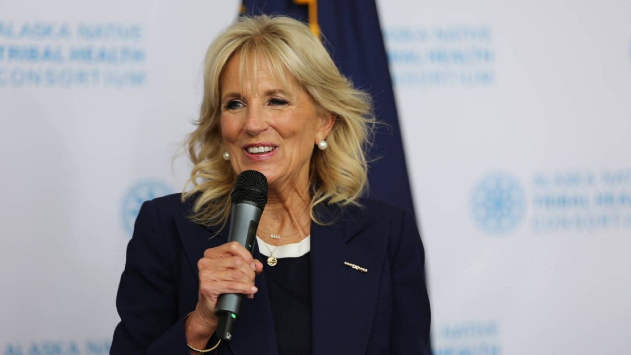 First lady Jill Biden addresses reporters during a visit, Wednesday, July 21, 2021, to the Alaska Native Health Tribal Health Consortium office in Anchorage, Alaska. Biden stopped in Alaska's largest city as she traveled to Tokyo, her first solo international trip as first lady, leading a U.S. delegation to the Olympic Games. (AP Photo/Mark Thiessen)