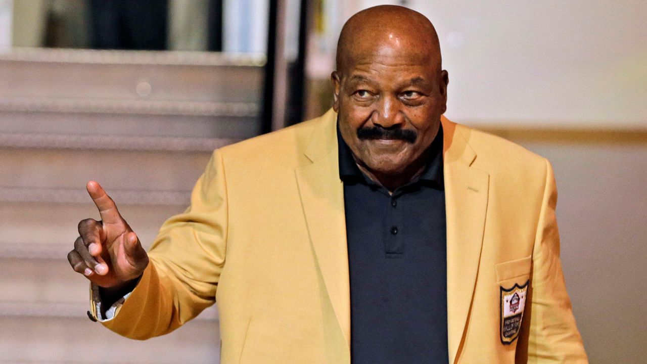 Jim Brown is introduced before the inaugural Pro Football Hall of Fame Fan Fest Friday, May 2, 2014, at the International Exposition Center in Cleveland. NFL legend, actor and social activist Jim Brown passed away peacefully in his Los Angeles home on Thursday night, May 18, 2023, with his wife, Monique, by his side, according to a spokeswoman for Brown's family. He was 87. (AP Photo/Mark Duncan)