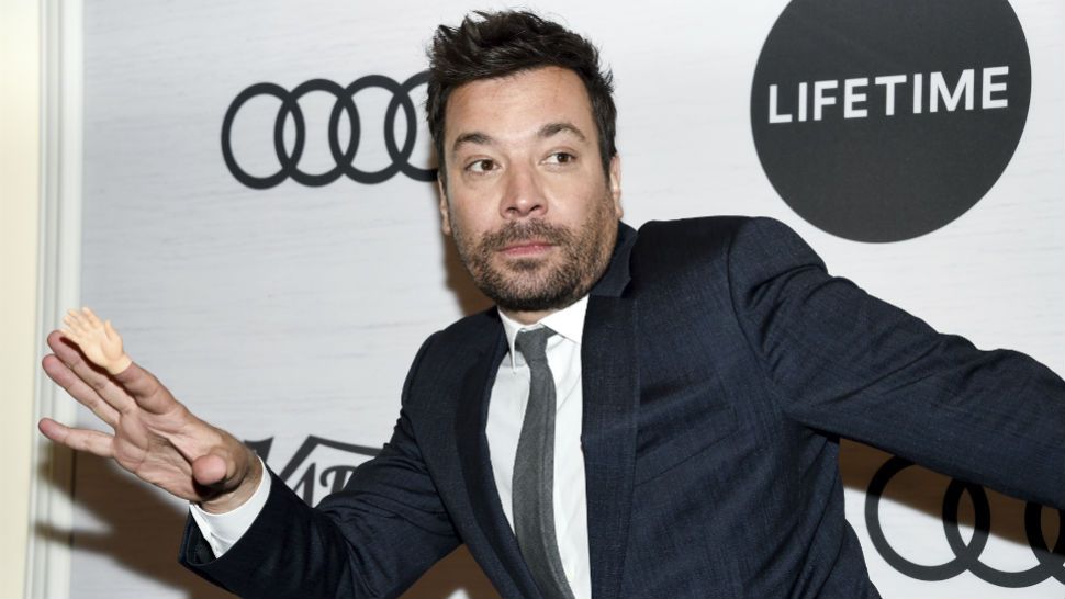 Talk show host Jimmy Fallon jokes around with tiny hands at Variety's Power of Women: New York in April. (Photo by Evan Agostini/Invision/AP)