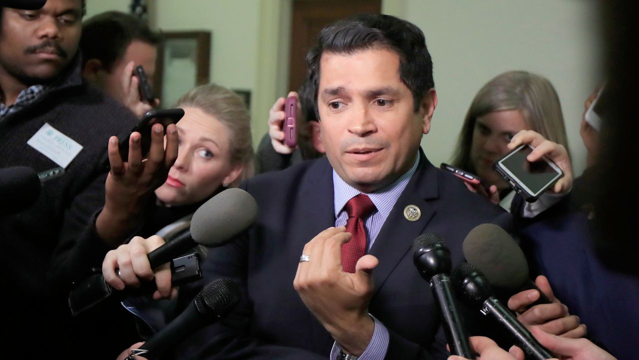 In this Dec. 7, 2018, file photo, Rep. Jimmy Gomez, D-Calif., speaks to reporters as he leaves a House Judiciary and Oversight Committee closed-door meeting on Capitol Hill in Washington. Gomez is running for re-election to his Los Angeles area 34th Congressional District seat. (AP Photo/Manuel Balce Ceneta, File)